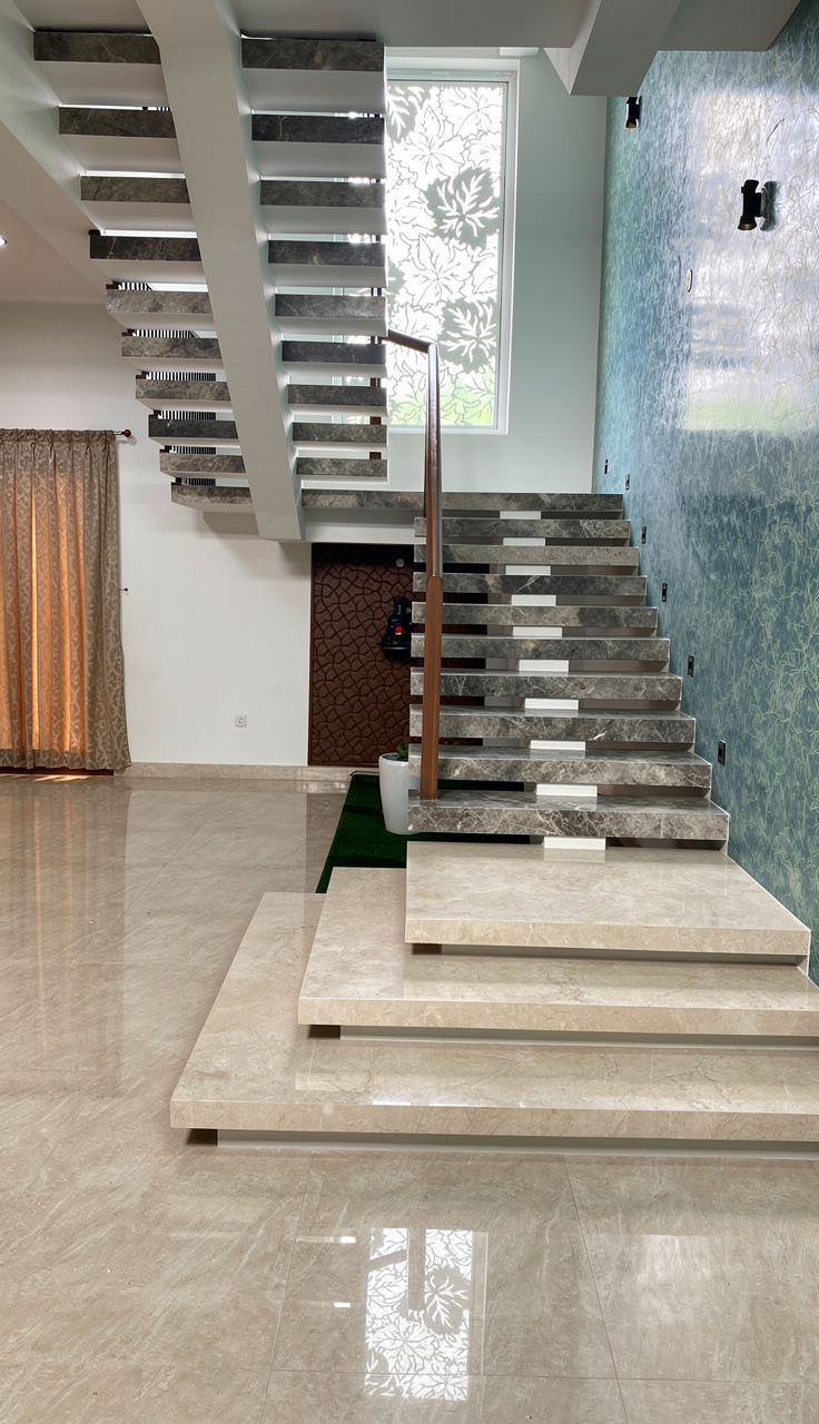 Half-turn single-beam steel staircase installed in Karur, Tamil Nadu